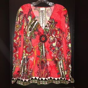 ECI top, orange-red w/ornate pattern, bead center